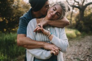 Couple holding each other and creating healthy communication with the help of couples therapy in OKC.