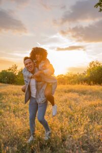 Couple laughing after doing a couples therapy intensive near me