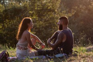 Marriage therapy in Colorado helping couple outside communicate through silence.