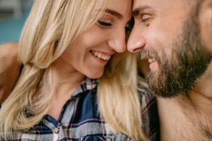 couple smiling at each other after committing to a couples intensive near me